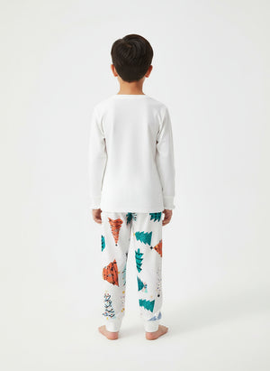 White sweatshirt and patterned pants set on a white background
