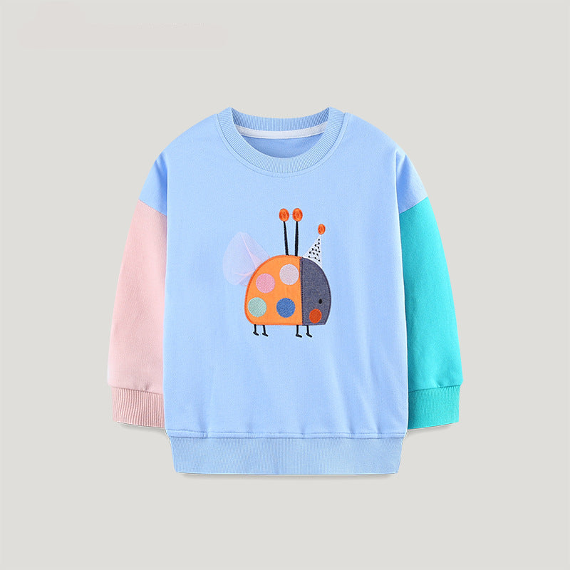 Children's sweater with a colorful ladybug design on a light gray background