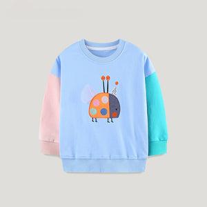 Children's sweater with a colorful ladybug design on a light gray background